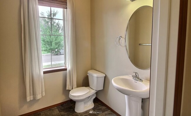 half bathroom on first floor - 596 NE Nantucket St