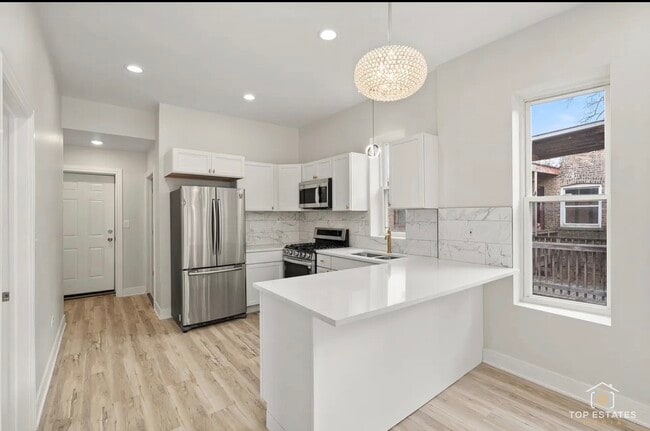 Building Photo - 5753 S Peoria St