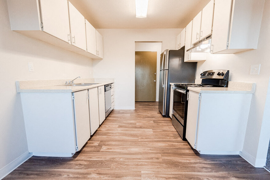 Lakewood Apartments - Arbor Pointe Apartments - Kitchen and Entryway, from Dining Room - Arbor Pointe