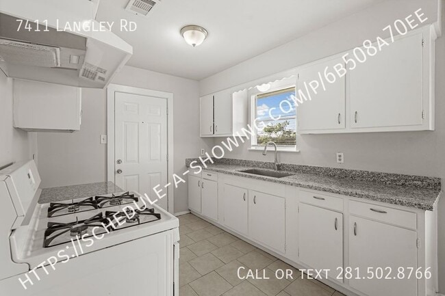 Building Photo - 7411 Langley Rd