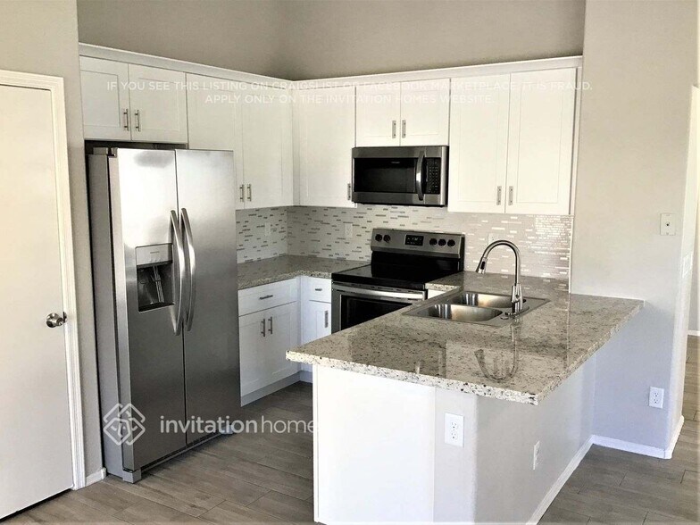 Building Photo - 10476 W Sunflower Pl