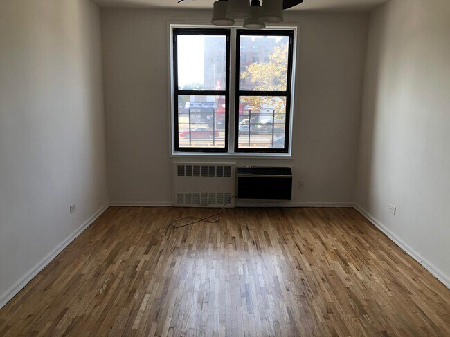 Building Photo - 10025 Queens Blvd