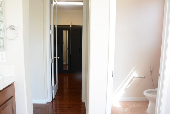 Building Photo - "Spacious 4-Bedroom Oasis with Granite Tou...