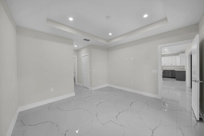 Building Photo - Brand-New Home in Lehigh Acres – Move-In Ready! FL 33974. Qualify for a deposit-free option and s...