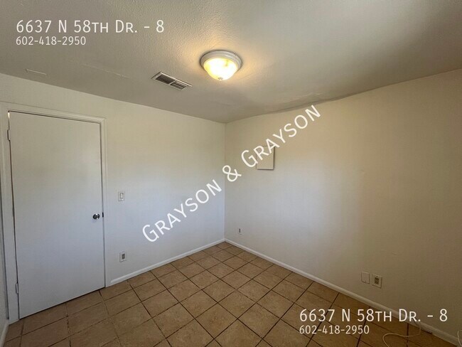 Building Photo - 6637 N 58th Dr