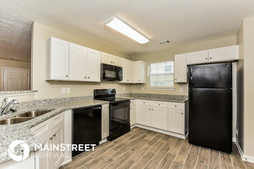 Building Photo - 7548 Garnet Dr