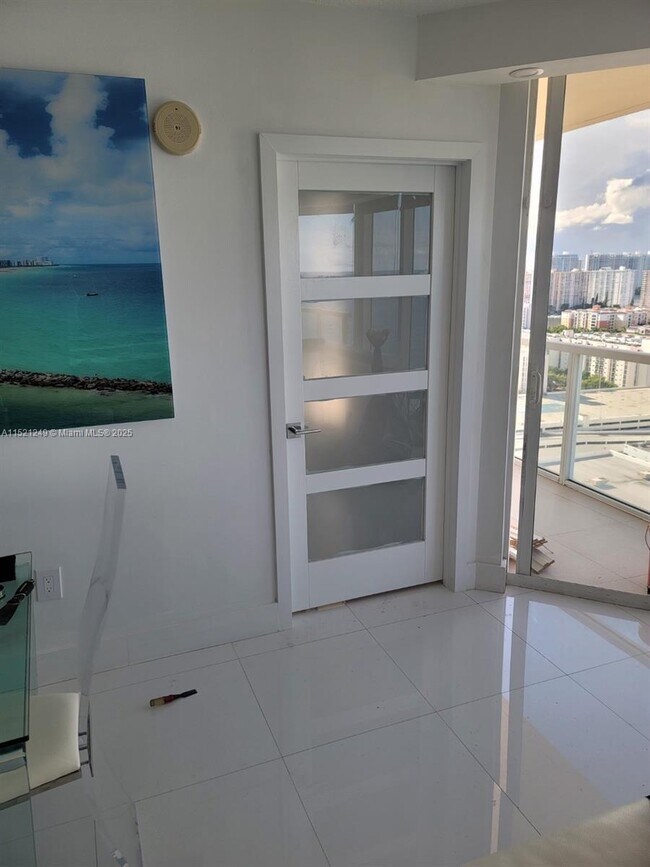 Building Photo - 16699 Collins Ave