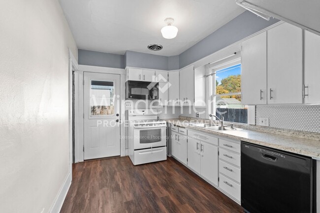 Building Photo - **Half off Full 1st Month's Rent** Beautiful 4-Bedroom Home In The Garland District