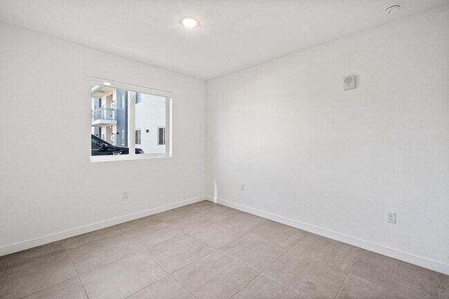 Building Photo - 1295 W 69th St