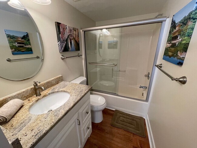 Building Photo - ANNUAL RENTAL - 3 BED / 2 BATH WITH CARPOR...