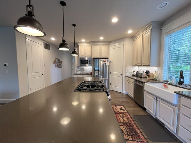 Building Photo - Spacious Corner-Lot Home with Three Levels...