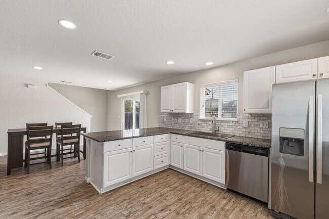 Building Photo - Gated Community Home with Solar Panels & All Appliances Included