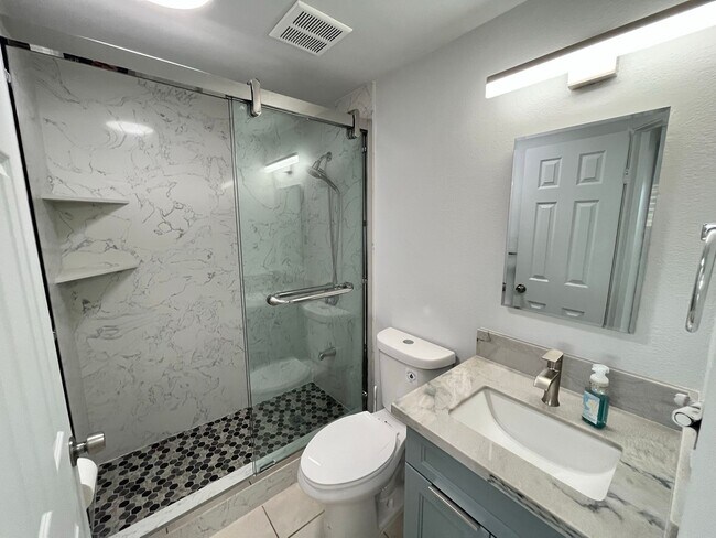 Building Photo - SECTION 8 OK! 2 level townhouse 3 Bedroom, 1 Bathroom Unit With 1 Parking Stall Available Now!