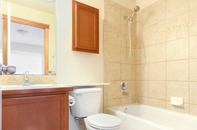 Building Photo - Updated Townhouse Near Fauntleroy Park with Private Suites and Parking