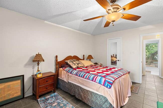 Building Photo - 8301 Greenslope Dr