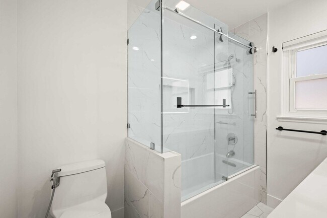 Building Photo - Stylishly Remodeled 4-Bedroom Home in Prim...