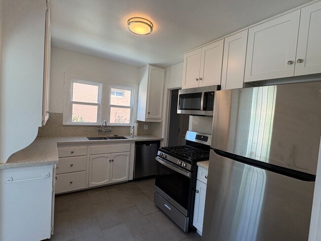 Building Photo - Charming Tudor Style 3 Bed 1.5 Bath PLUS Studio Guest House complete with kitchen and bath!
