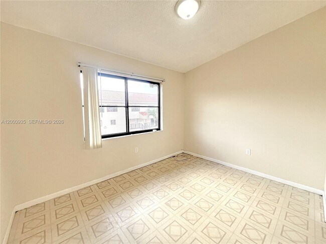 Building Photo - 5575 W 26th Ct