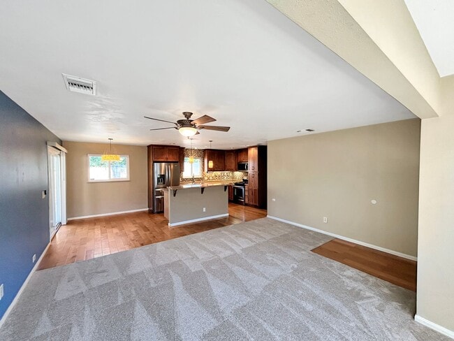 Building Photo - Beautiful 4BD/2BA W/ 2-Car Garage, AC, and...