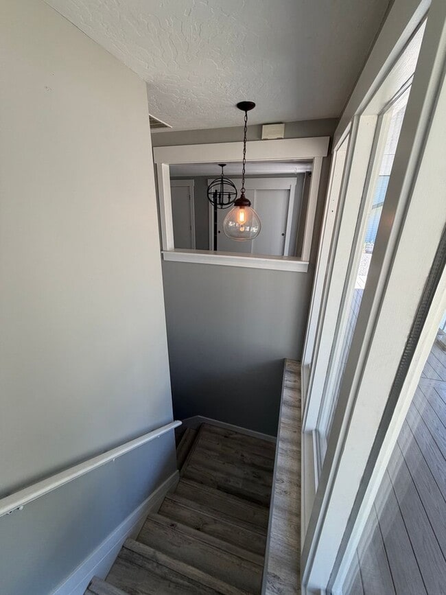Building Photo - Spacious 4BR/3BA Home with Deck, Fenced Yard & Garage