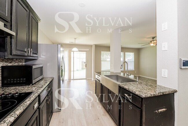 Building Photo - Turn the key. Enter. Smile. Repeat every day!