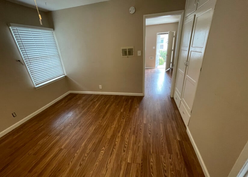 Bedroom looking at livingroom and front door - 2540 W Ramona Rd