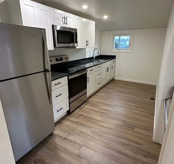 Building Photo - this beautifully updated three-bedroom, one-and-a-half-bath home in Columbia