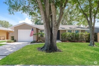 Building Photo - 6521 Bonnie Bay Cir N