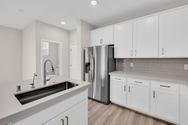 Building Photo - BRAND NEW - NEVER LIVED IN 3 BR/2.5 BA Townhouse across the street from Henderson Hospital and Me...