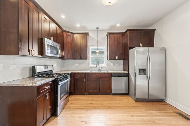 Building Photo - 7938 S Bennett Ave