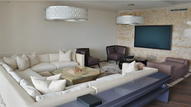 Building Photo - 10295 Collins Ave