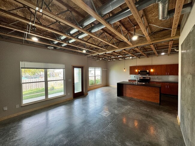 Building Photo - Stunning Modern Urban Loft – Spacious, Sty...