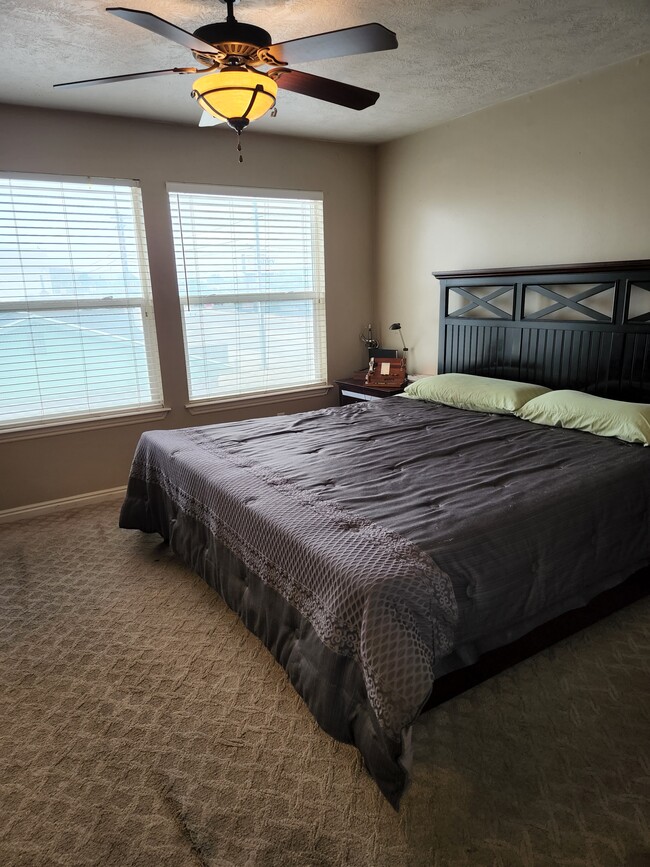 Master Bedroom with King Size Bed - 710 E Sandy Point Dr