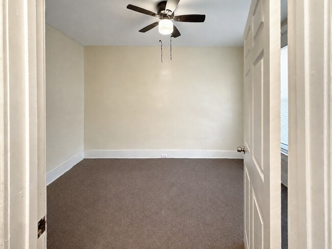 Building Photo - Charming Baltimore Rowhome with Updated Kitchen, Covered Front Porch & Basement