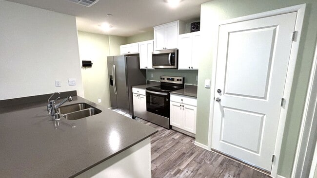 Building Photo - Upscale New Construction Gated 3/2.5 Townhome with Resort-Style Amenities!