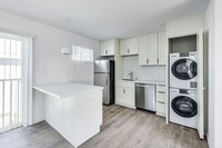 Building Photo - BRAND NEW 2 BEDROOM w/ Patio + W/D in unit