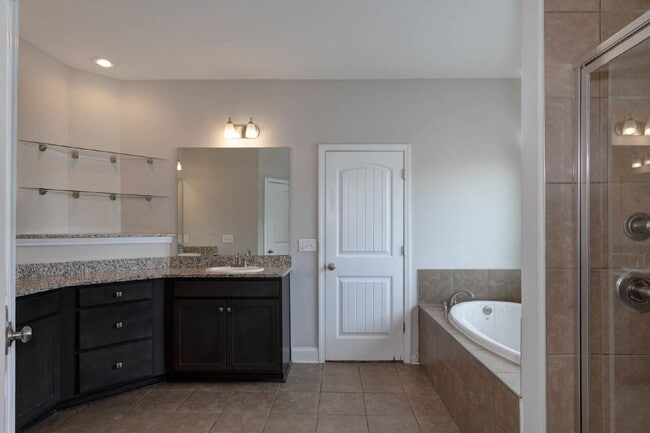 Building Photo - 4BR/3.5BA · 2,809 SF · Owner's Suite on Main · Fenced Yard · Midland, GA — $2,800/mo
