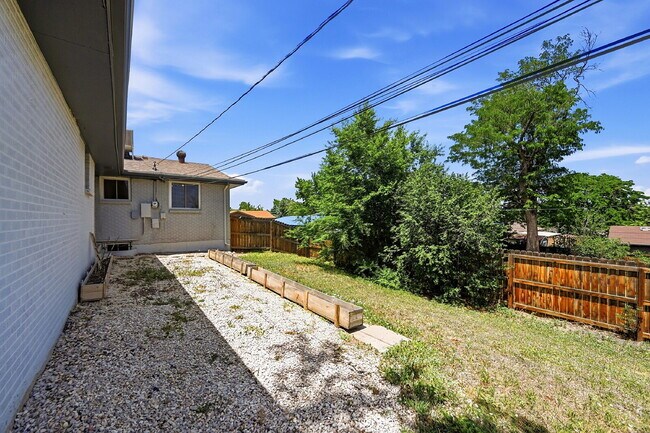 Building Photo - $2,795.95- 4 Bed, 2 Bath Home in Arvada with In-Unit Laundry and Fenced Yard!