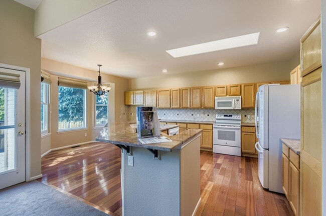 Building Photo - Spacious 4-Bedroom Home in Parker’s Desira...