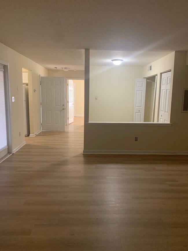 Building Photo - ONE LEVEL CONDO NEAR REX HOSPITAL -Firepla...