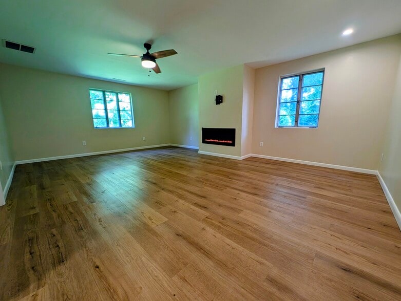 Master bedroom with electric fireplace - 1128 Otello Ave