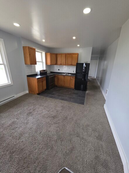 Front room to kitchen - 7061 Elmhurst St