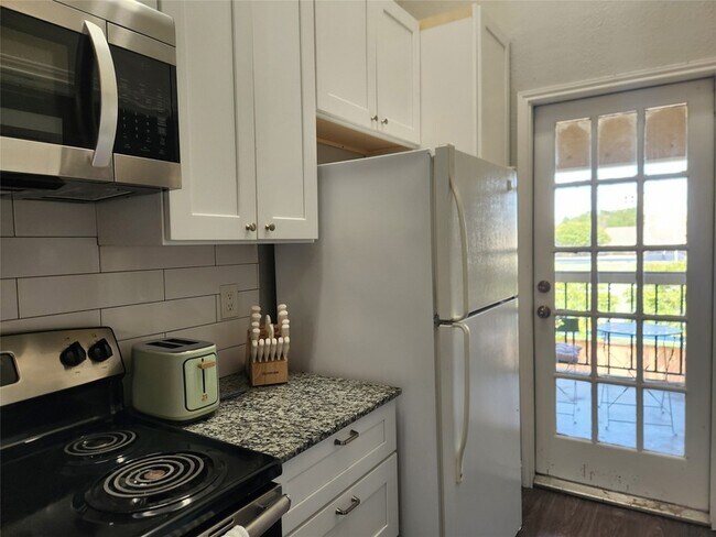 Building Photo - 4800 W Lovers Ln
