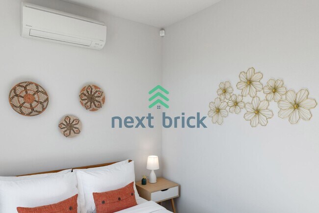 Building Photo - Offer: Unfurnished option available at $3,250, with an optional furnished package for an addition...
