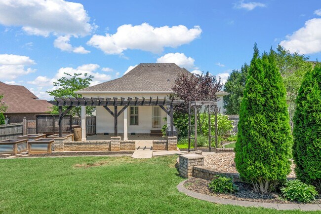 Building Photo - Elegant 4-Bedroom Home with Vaulted Ceilin...