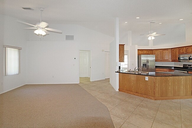 Building Photo - Lakes of Jacaranda Annual Home for Rent