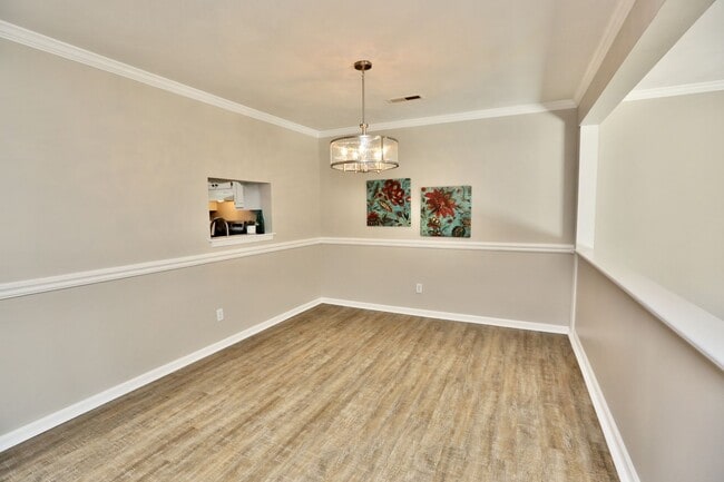 Building Photo - Updated End-Unit Brick Townhome Ready NOW!...