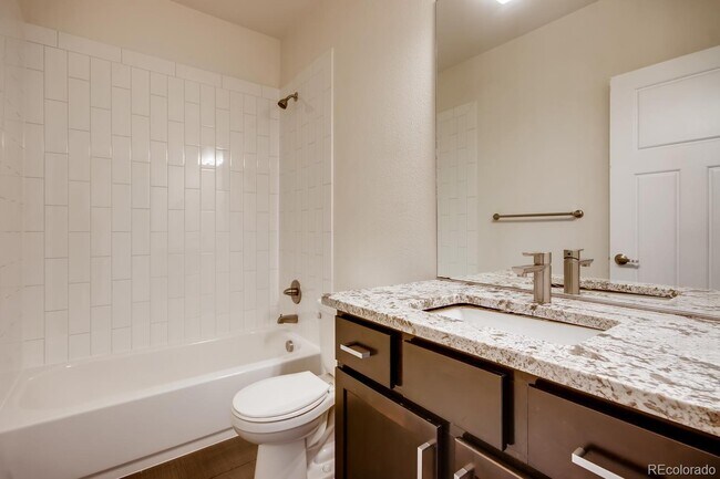 Building Photo - "Charming 2-Bed, 2-Bath Home with Gleaming Hardwood Floors in Vibrant Denver!"