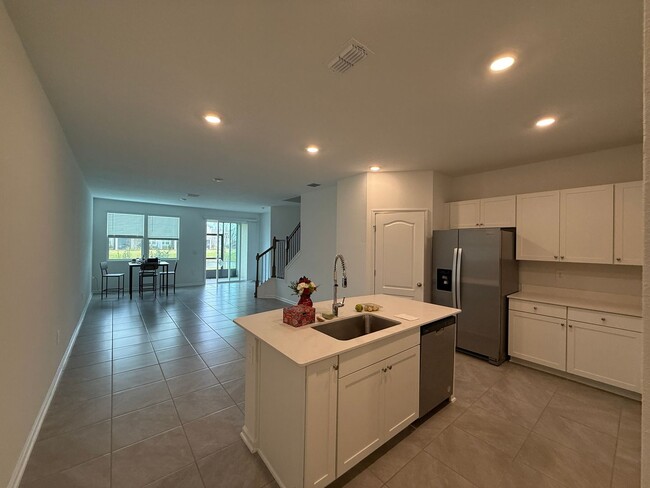 Building Photo - Serene Pond-View Townhouse in Palm Coast: ...