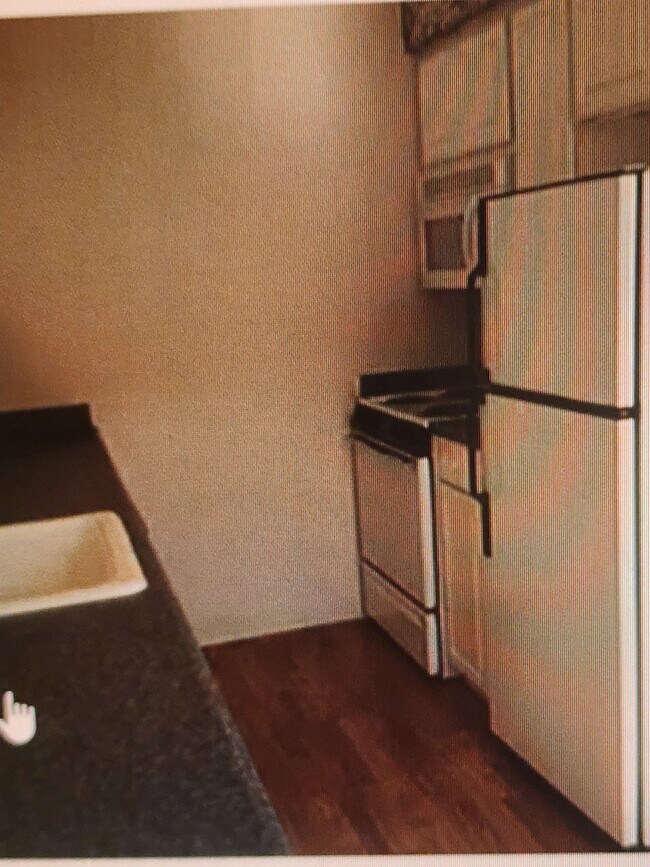 Galley kitchen - 50 NE Village Squire Ave